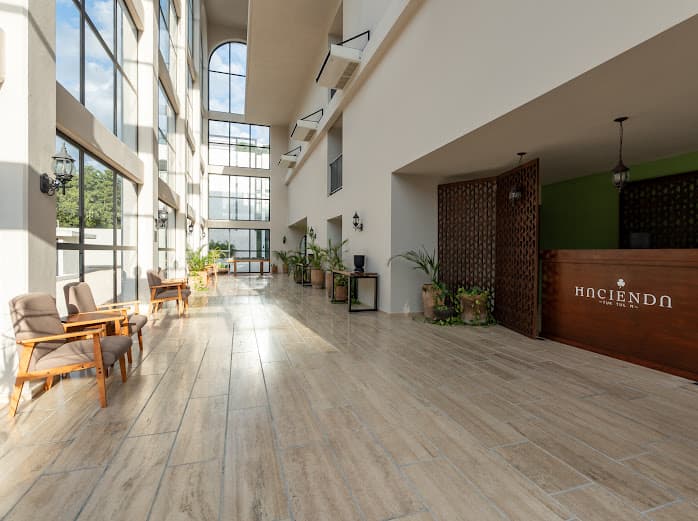 Modern lobby with comfortable seating area 24 hour security