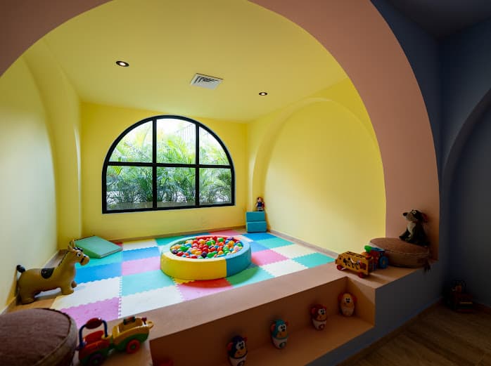 Colorful kids play area with playground equipment